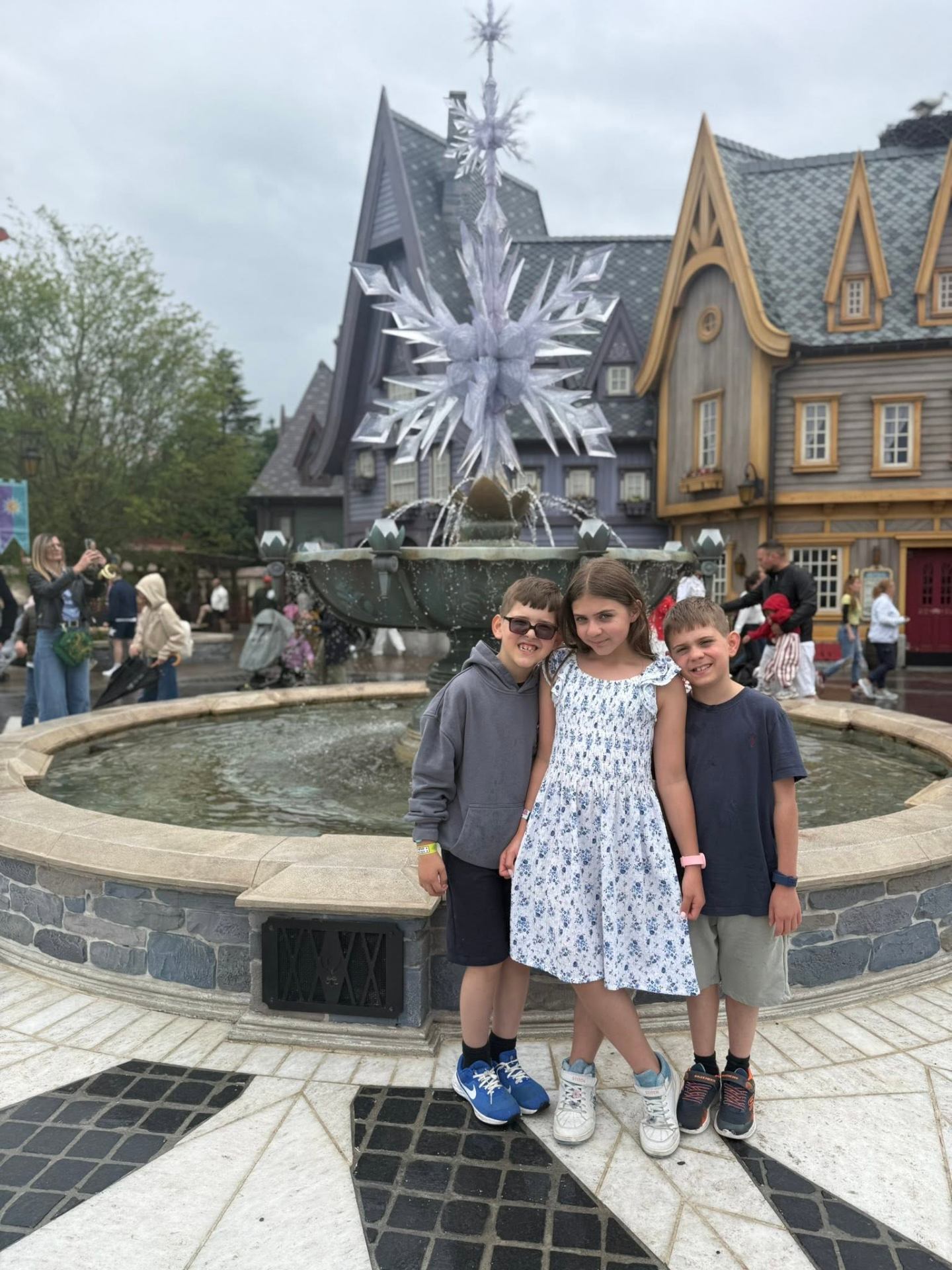 Three of the kids by the Frozen fountain